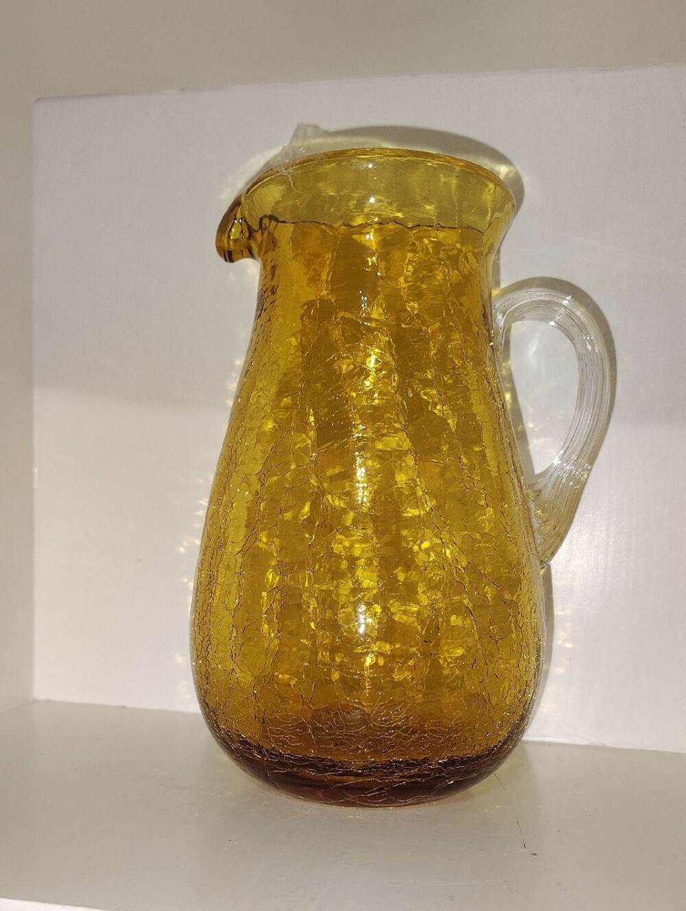 Vtg Hand-blown amber crackle glass pitcher with applied clear handle